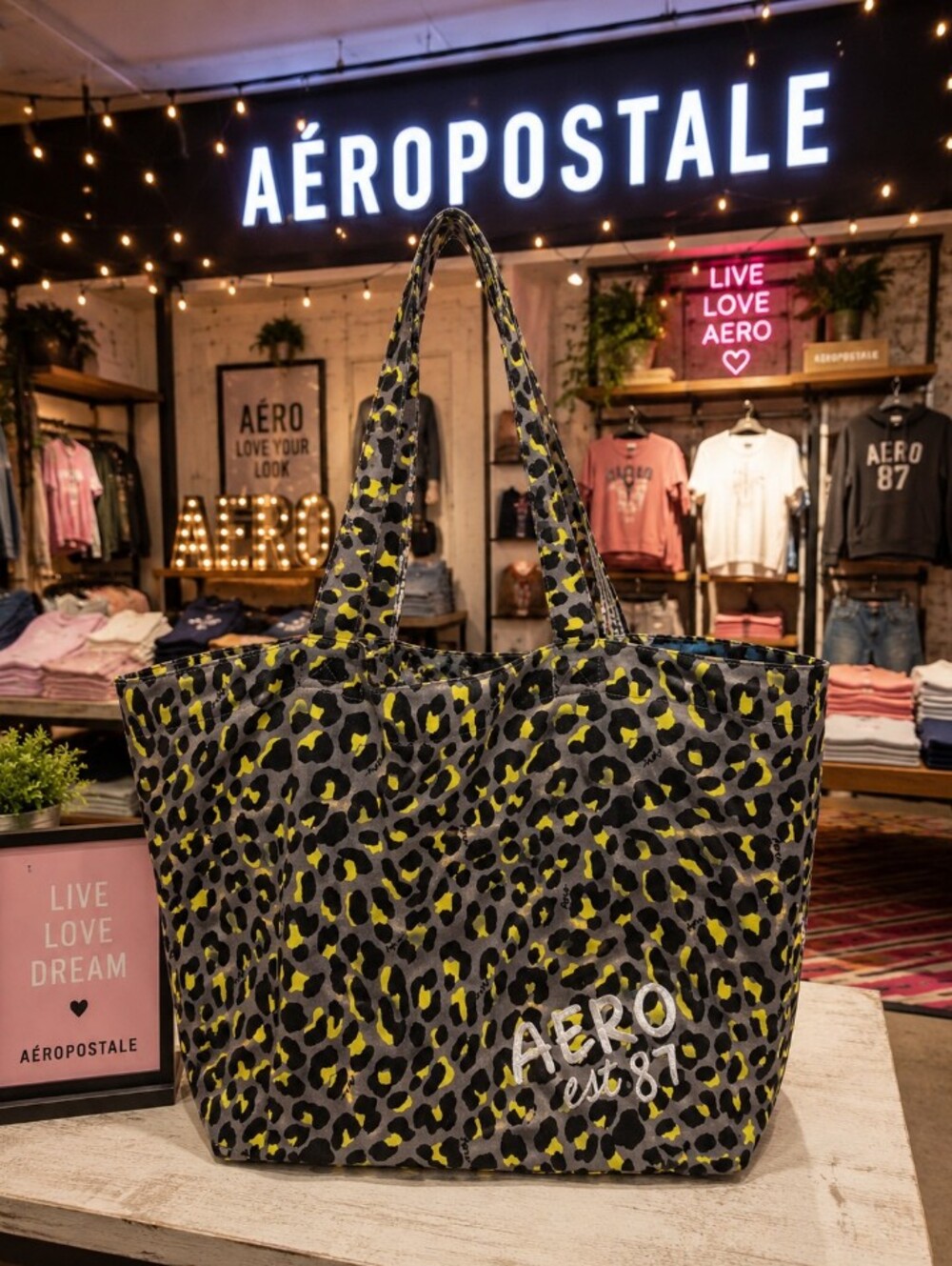 5/$100 Aeropostale White Logo Patch on Gray Fabric